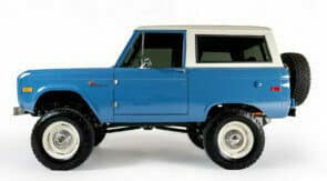 Blue Early Bronco with a modern drive by Kincer Chassis
